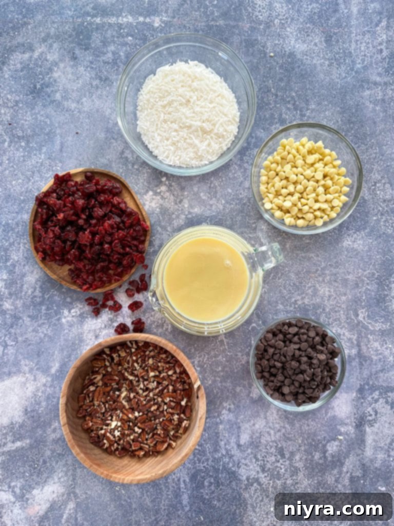 Close-up of shredded coconut, dried cranberries, and chopped pecans