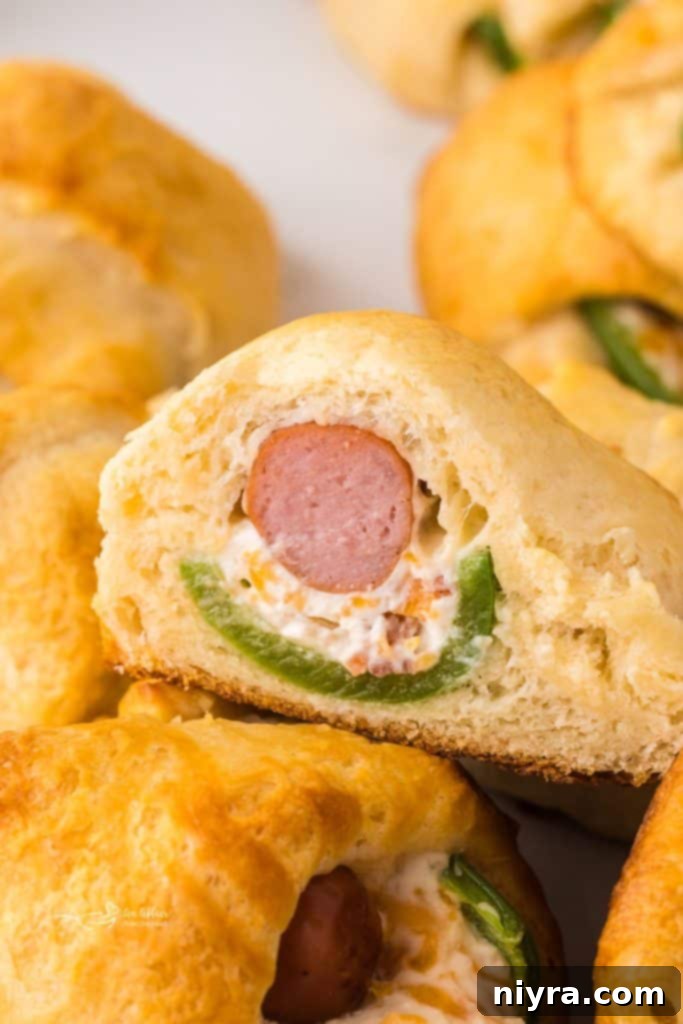 Platter of freshly baked Jalapeño Popper Pigs in a Blanket, ready to serve