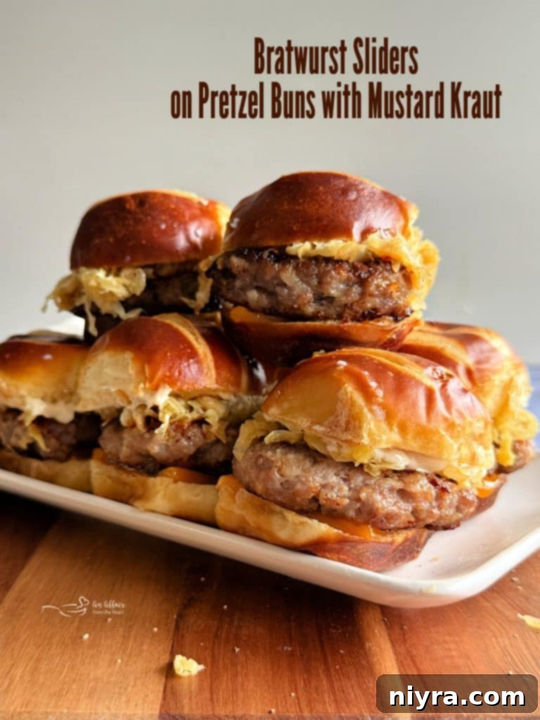 A large platter of Bratwurst Sliders, perfectly golden and ready for serving.