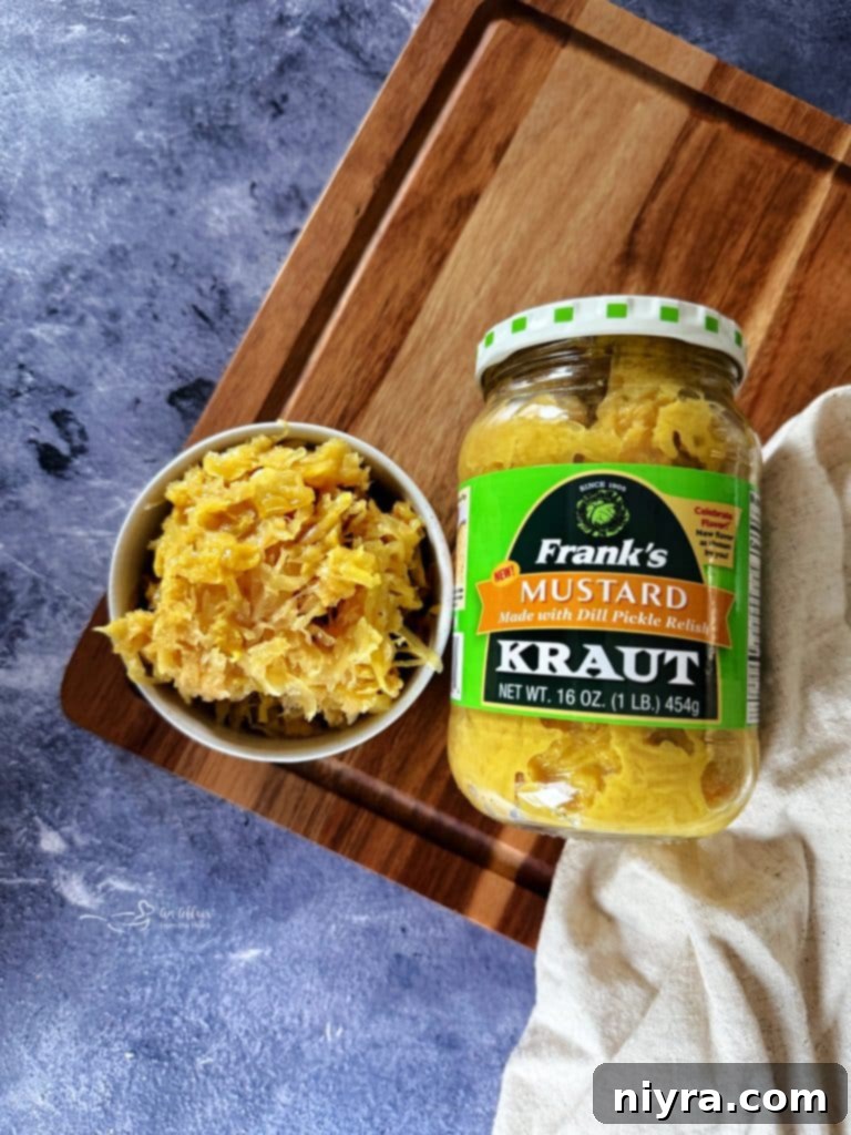 A jar of Frank's Mustard Kraut prominently displayed.