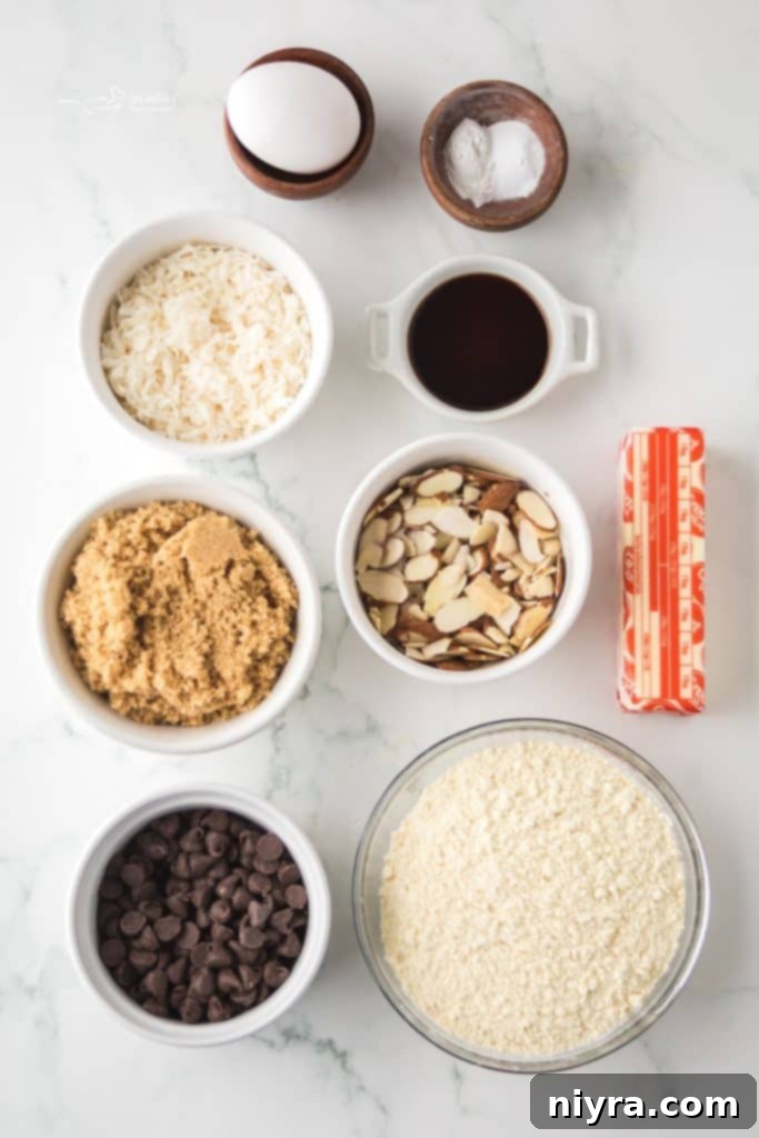 Close-up of three freshly baked Almond Joy Cookies