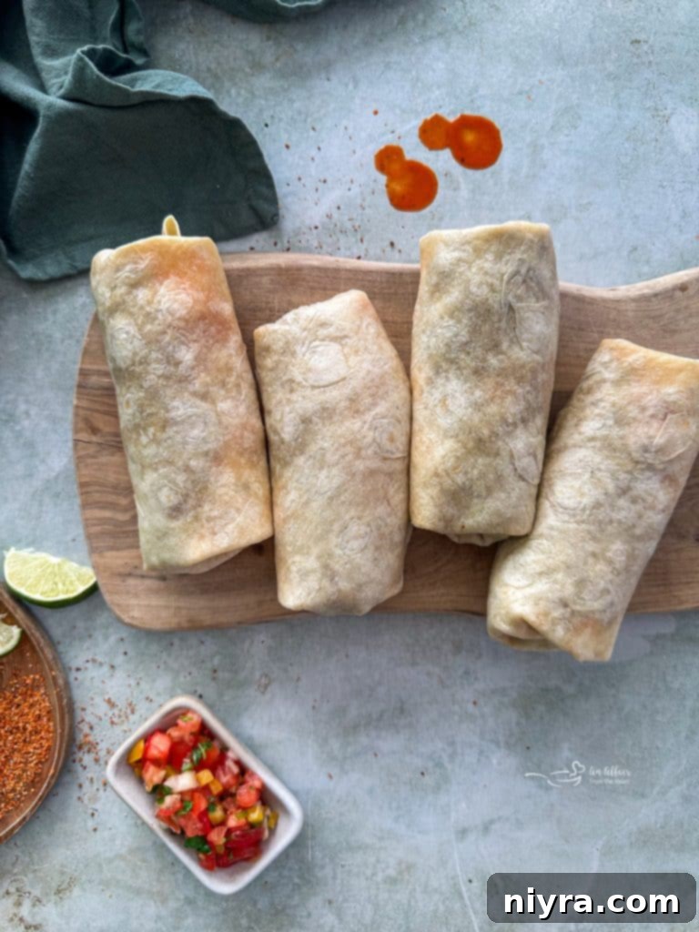 A close-up shot of a plate of homemade Copycat Taco Bell Meximelts, ready to be enjoyed.