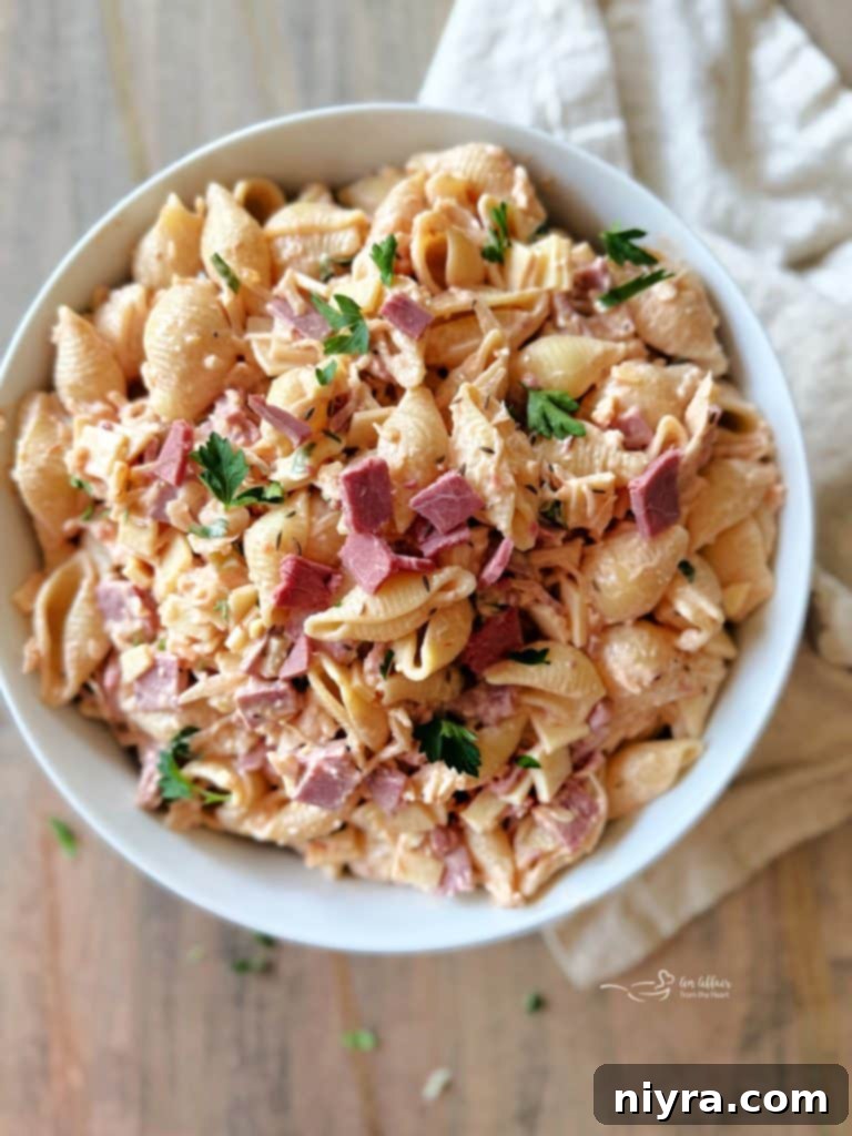 Reuben Pasta Salad in a serving bowl with a spoon