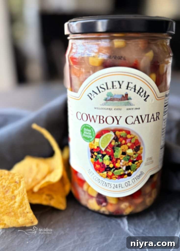 Jar of Paisley Farm Cowboy Caviar with ingredients.