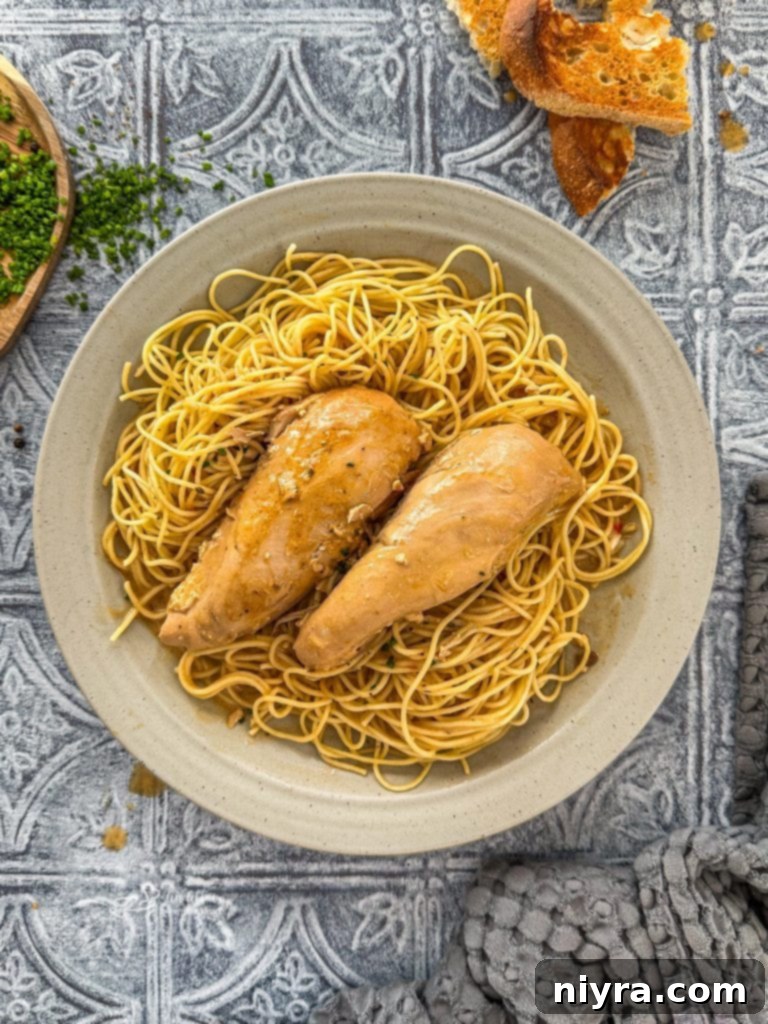 Slow Cooker Angel Chicken with pasta, ready to be plated.