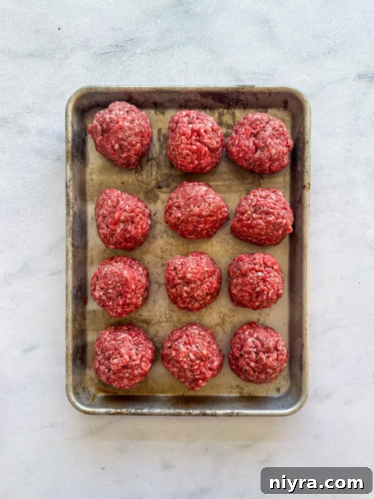 Thin burger patties being formed