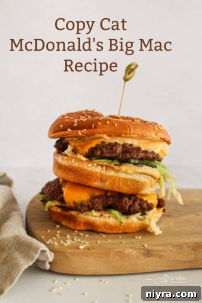 Two homemade Big Macs on a board