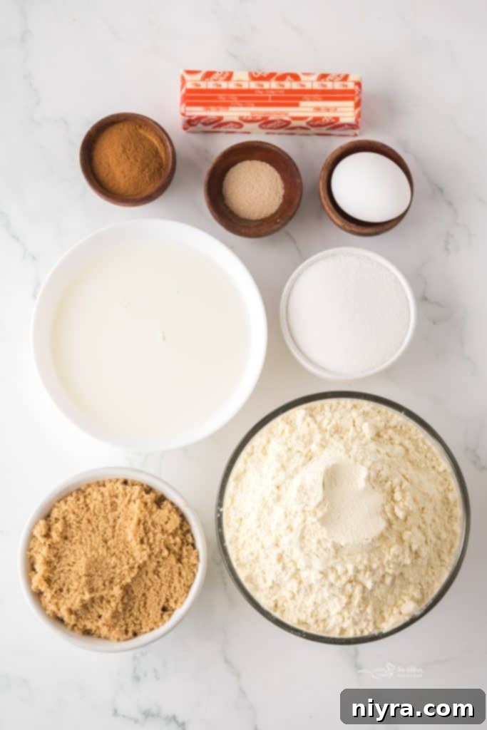 Ingredients for air fryer cinnamon rolls laid out on a kitchen counter.