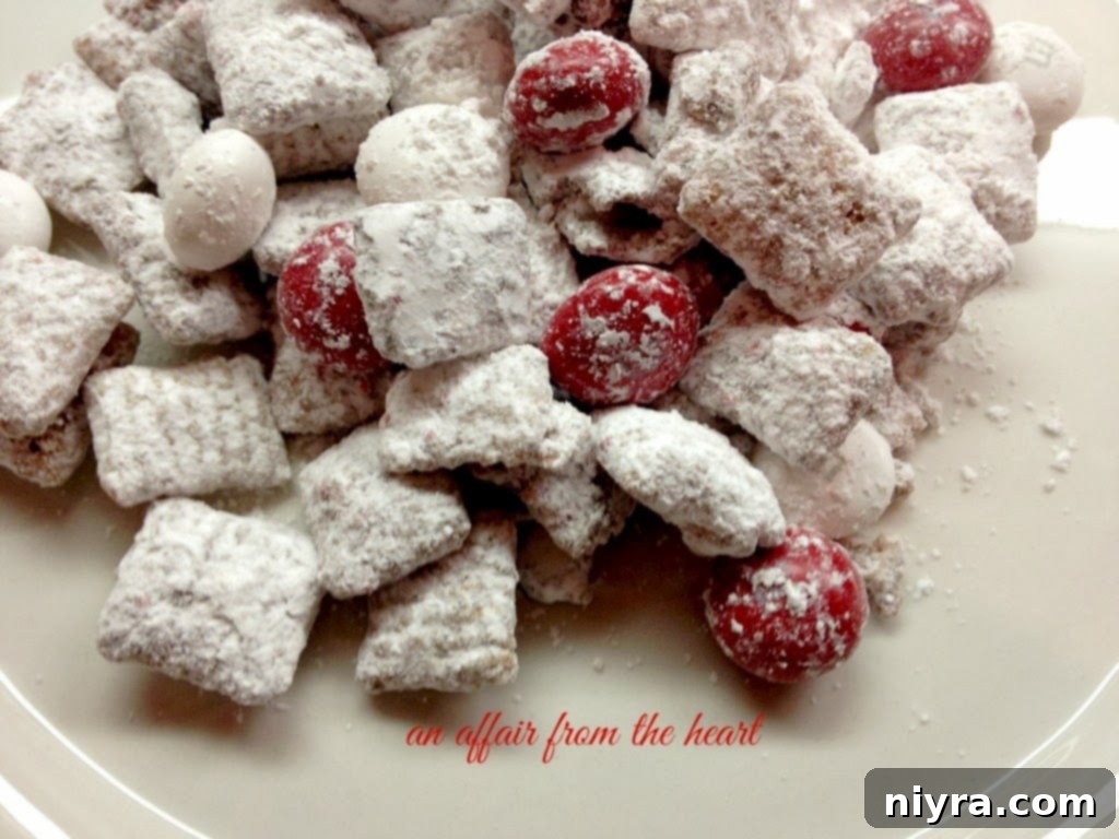 Close-up of melted white chocolate peppermint kisses, a key ingredient for the holiday puppy chow