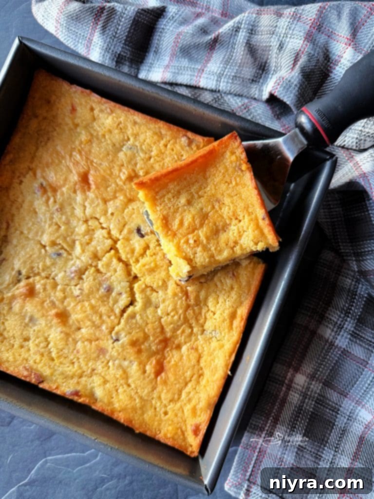 Mixing ingredients for Cowboy Corn Casserole in a bowl.