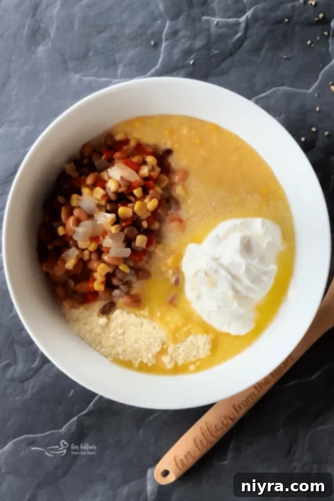Prepared baking dish of Cowboy Corn Casserole before baking.