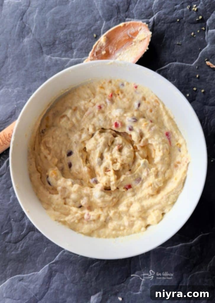 Cowboy Corn Casserole batter mixed and ready to be baked.