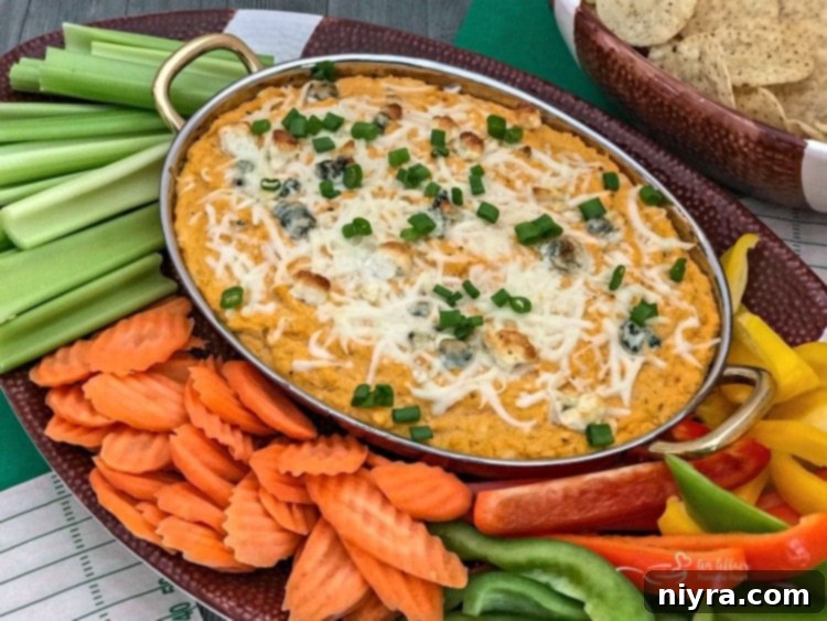 Freshly baked Buffalo Cauliflower Dip, ready to be served