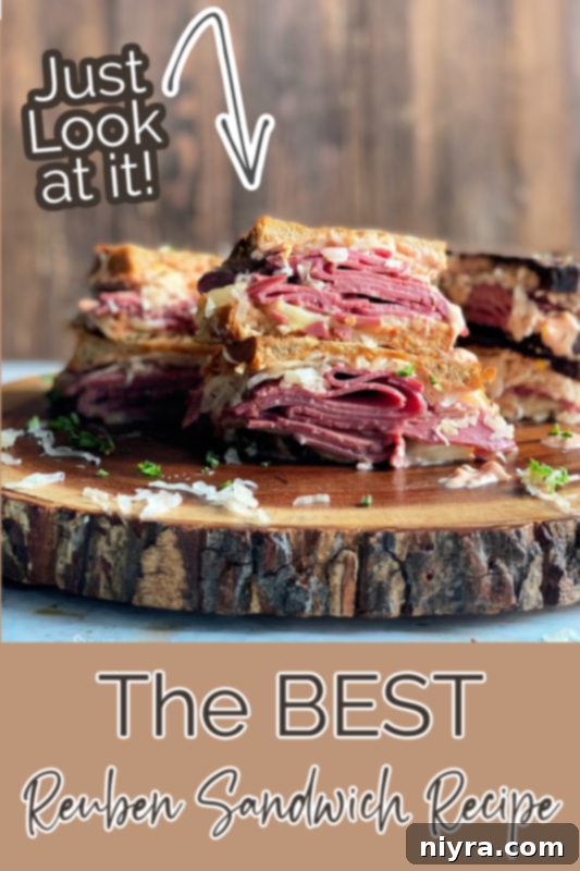 Authentic Reuben Sandwich 13 A mouth-watering image of a Reuben sandwich with a 'Pin It' call to action