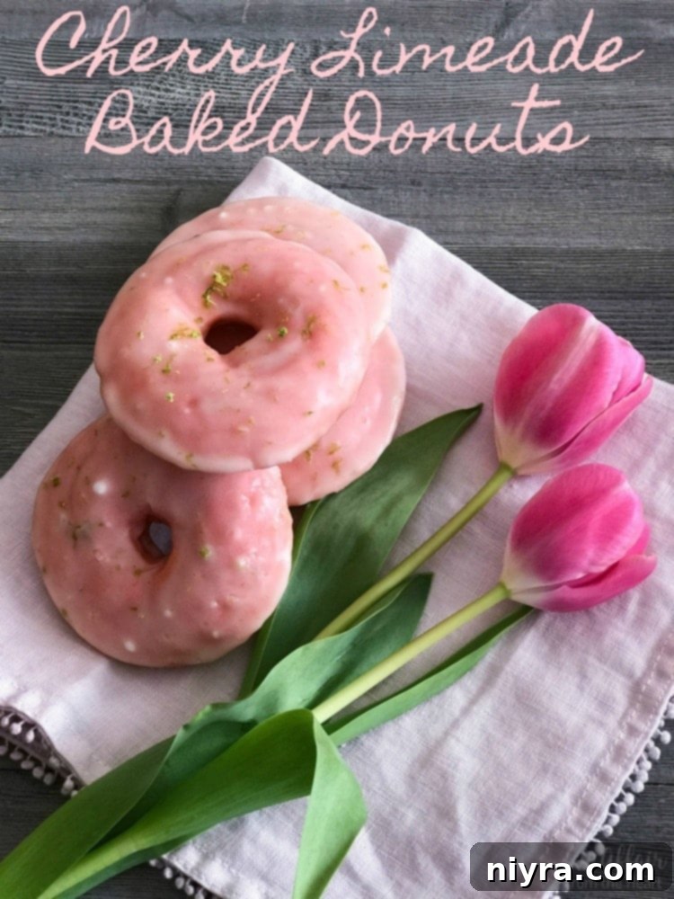 Sweet-Tart Cherry Lime Baked Donuts 12 Hero shot of Cherry Limeade Baked Donuts, beautifully glazed.
