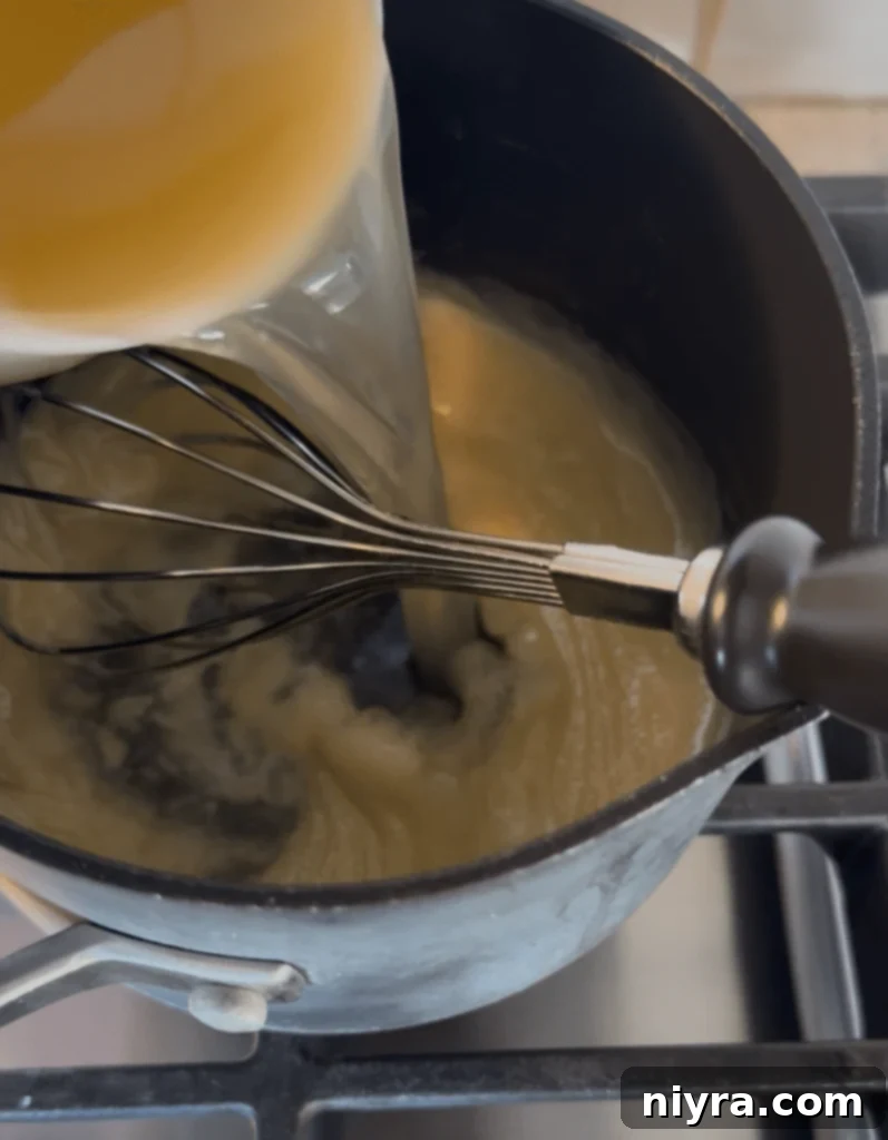 Slow Cooker Chicken and Sauerkraut Comfort Soup 11 Slow Cooker Creamy Chicken and Sauerkraut Soup Simmering