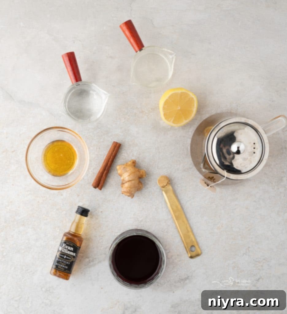 Raspberry Hot Toddy: A Soothing Cold Remedy 7 Raspberry Hot Toddy ingredients in glass