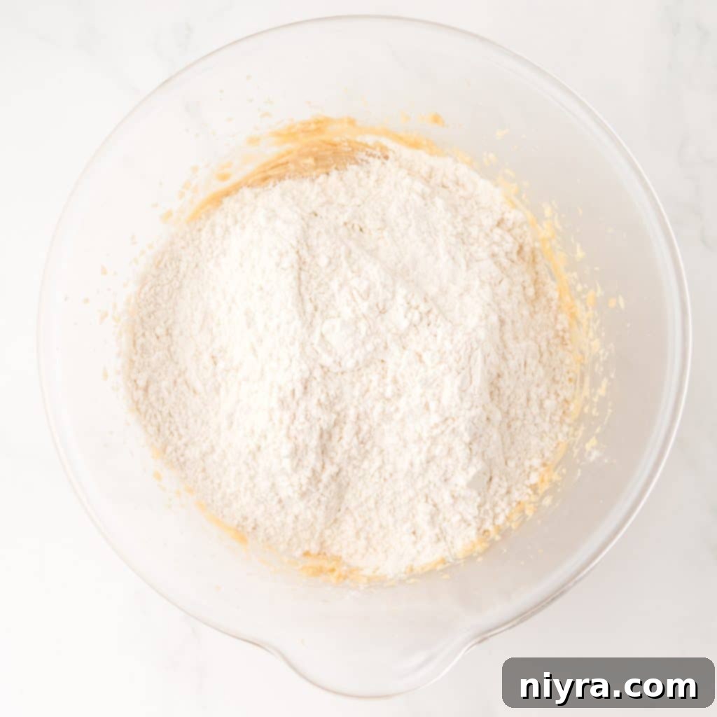 Adding Dry Ingredients to the Pop Tart Bar Dough