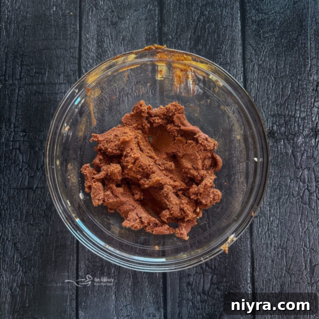 Mixing brown sugar and cinnamon for the Red Velvet Cinnamon Roll filling